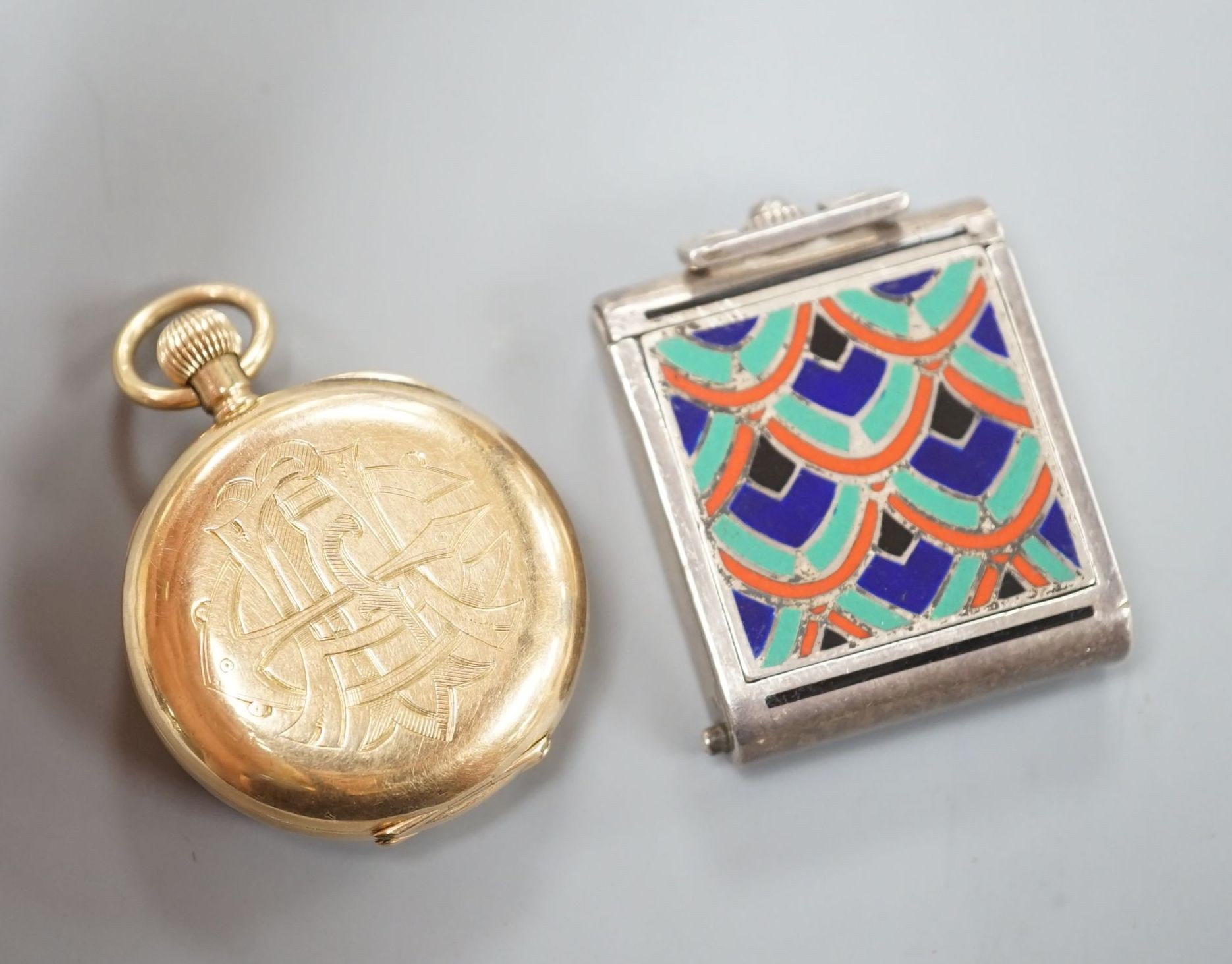 A 14ct open face fob watch, the inner case stamped Omega, case diameter 30mm, gross weight 29.6 grams and a Swiss white metal and polychrome enamel travelling watch.
